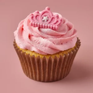 Cupcake personnalisé avec glaçage rose décoré d’une couronne et de paillettes